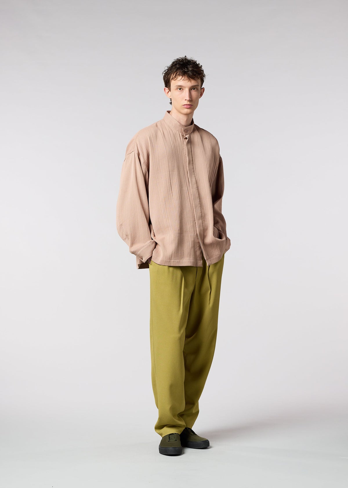 A model wears the IM MEN DOUBLE WEAVE CREPE shirt.