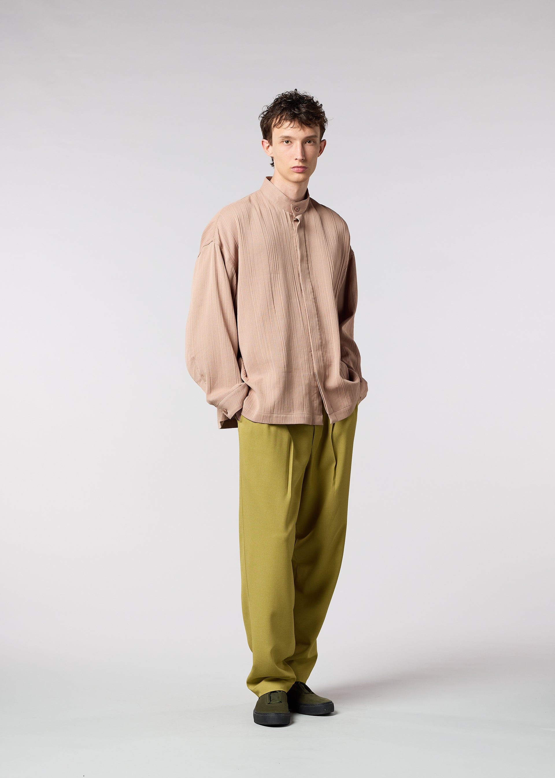 A model wears the IM MEN DOUBLE WEAVE CREPE shirt.