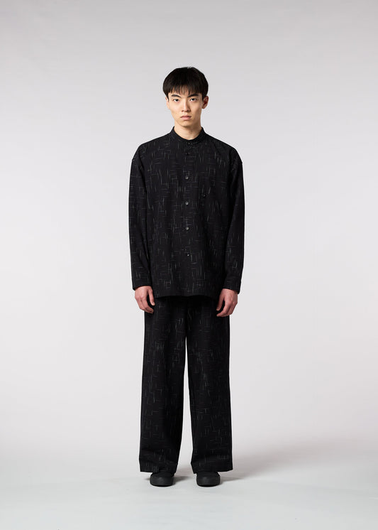 A model wears the IM MEN KASURI shirt.