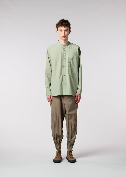 A model wears the IM MEN ONE CUT SHIRT shirt.