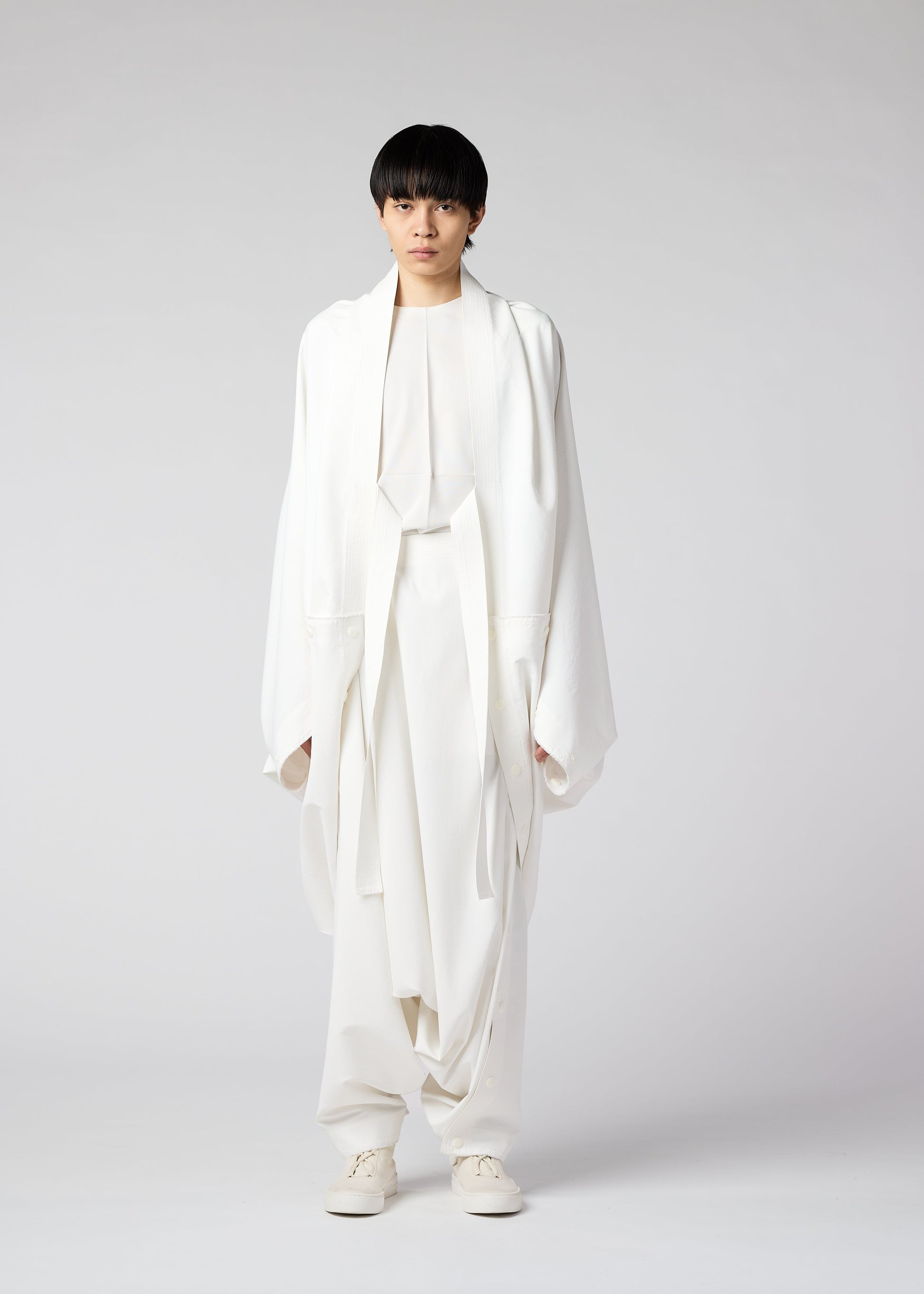 A model wears the IM MEN FLY coat.