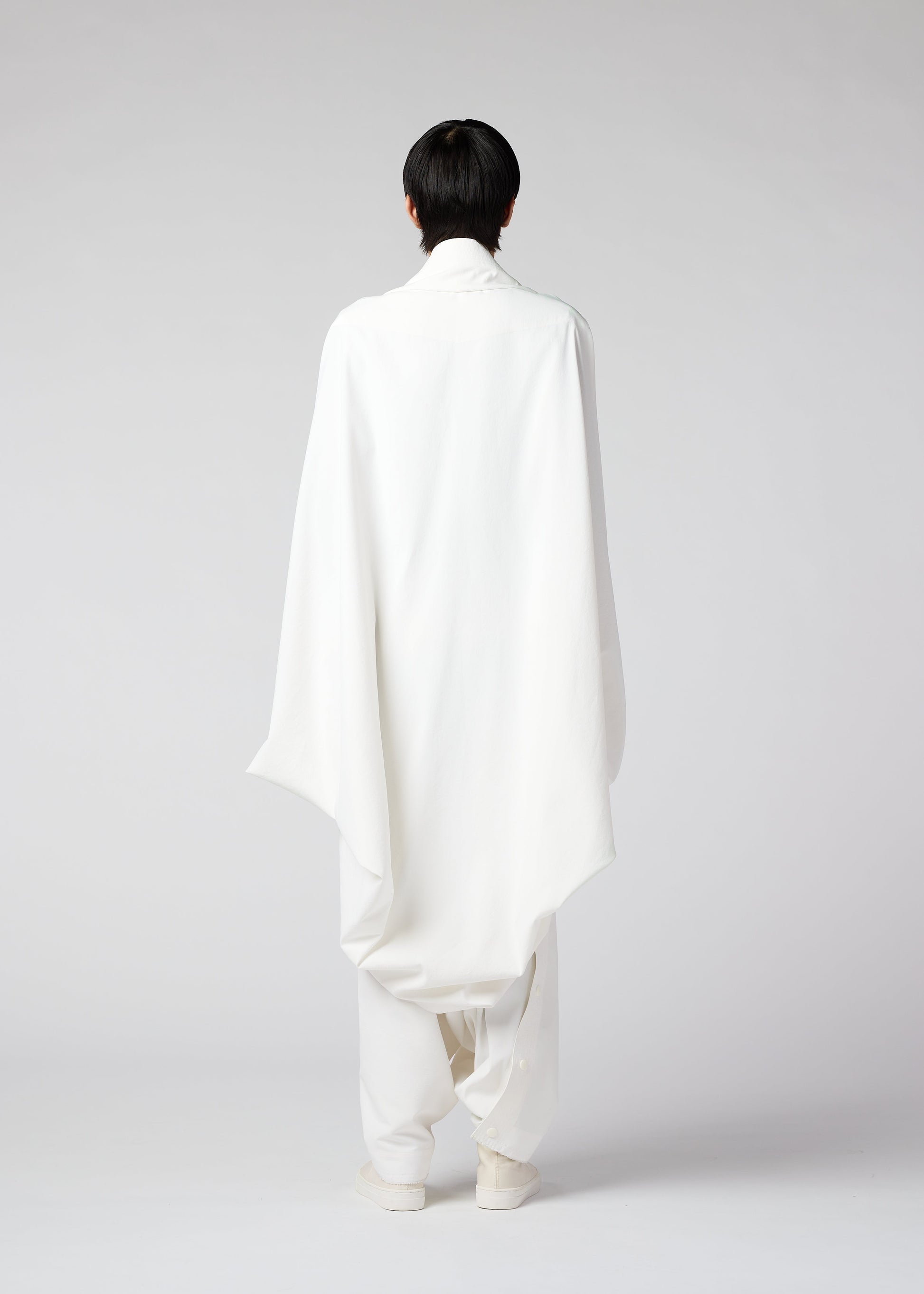 A model wears the IM MEN FLY coat.