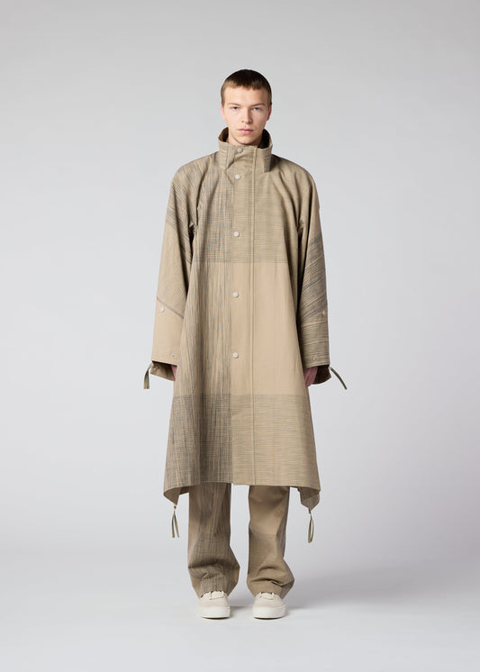 A model wears the IM MEN KASURI coat.
