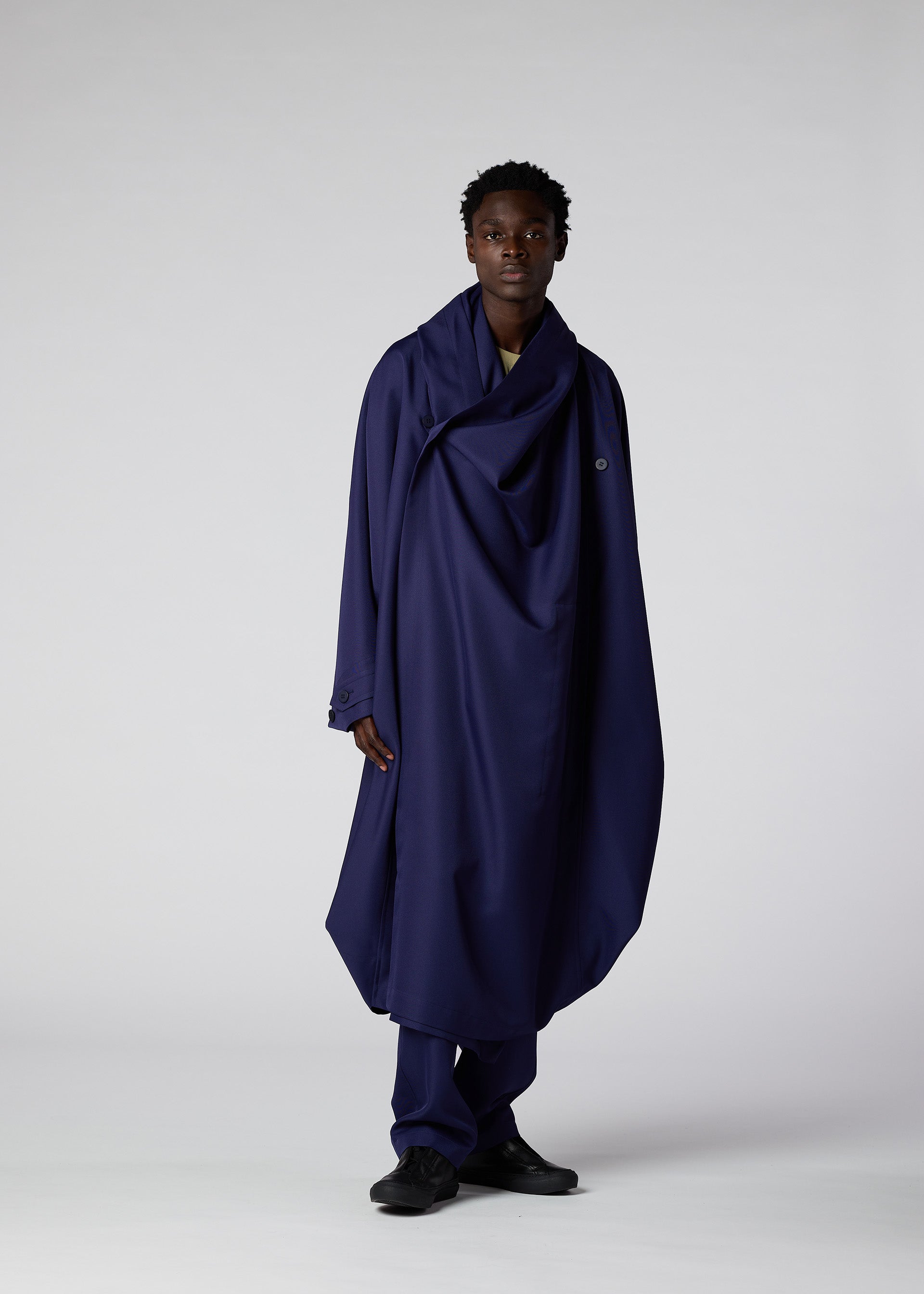 A model wears the IM MEN COCOON coat.