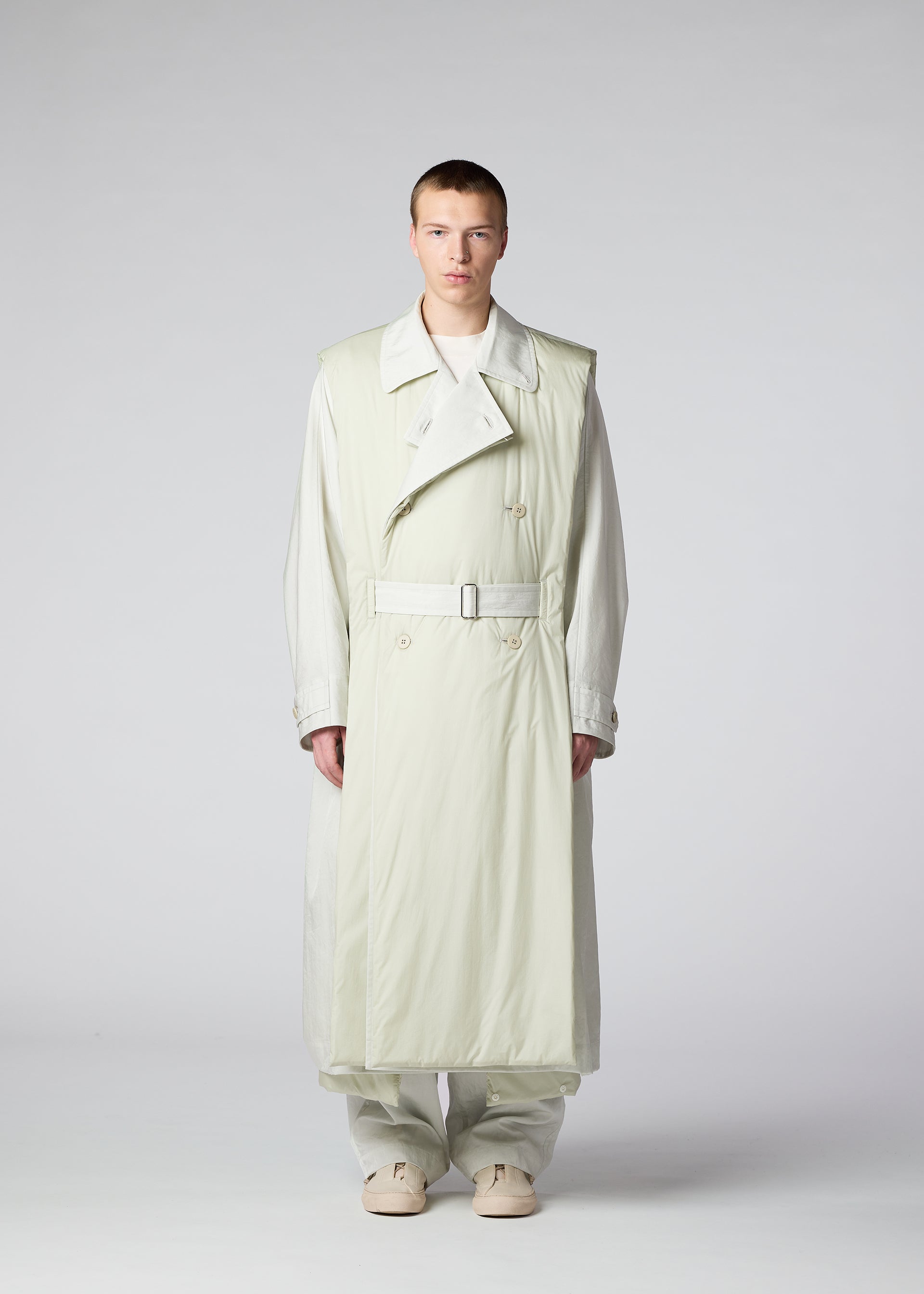 A model wears the IM MEN SWITCH coat.