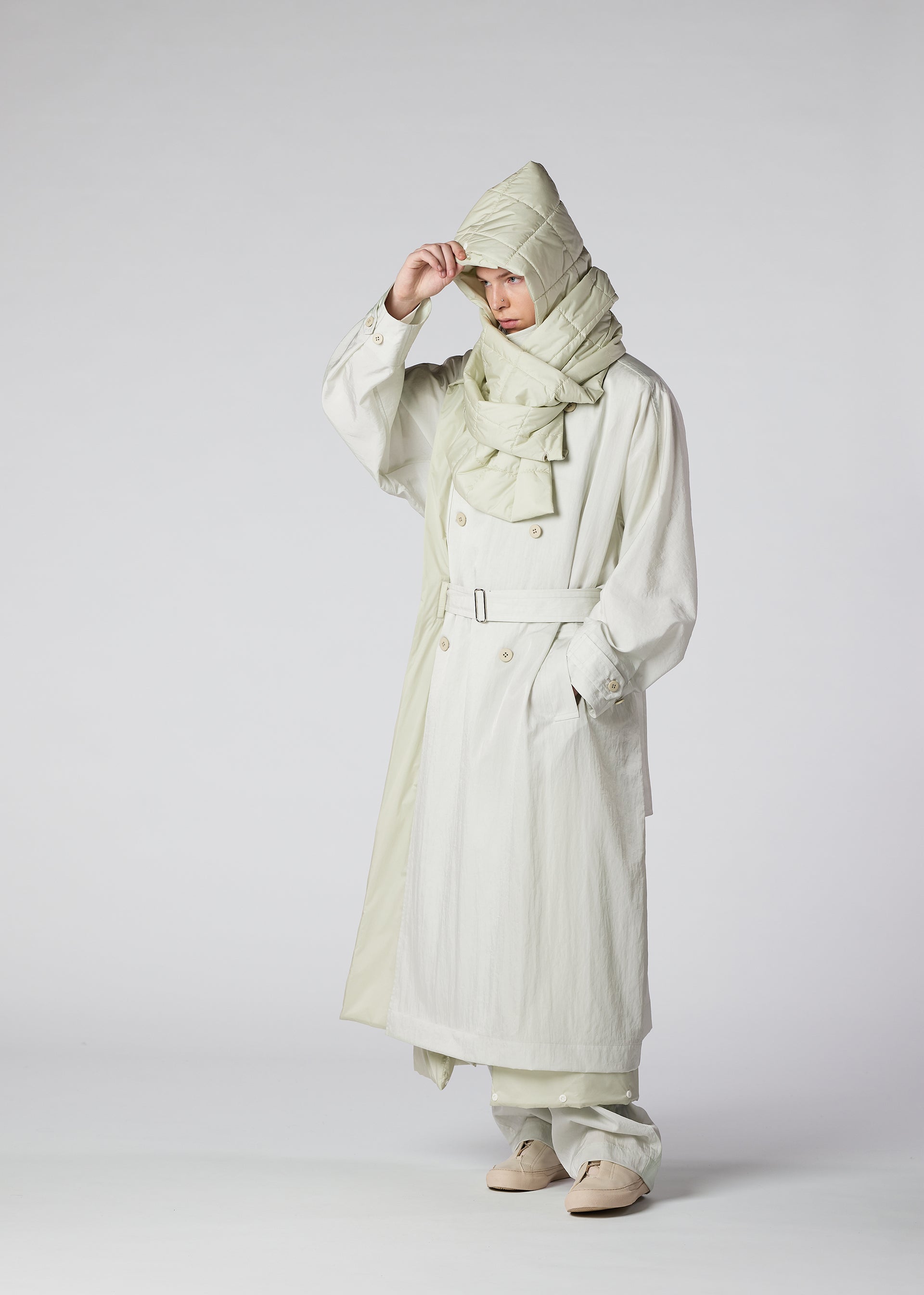 A model wears the IM MEN SWITCH coat.