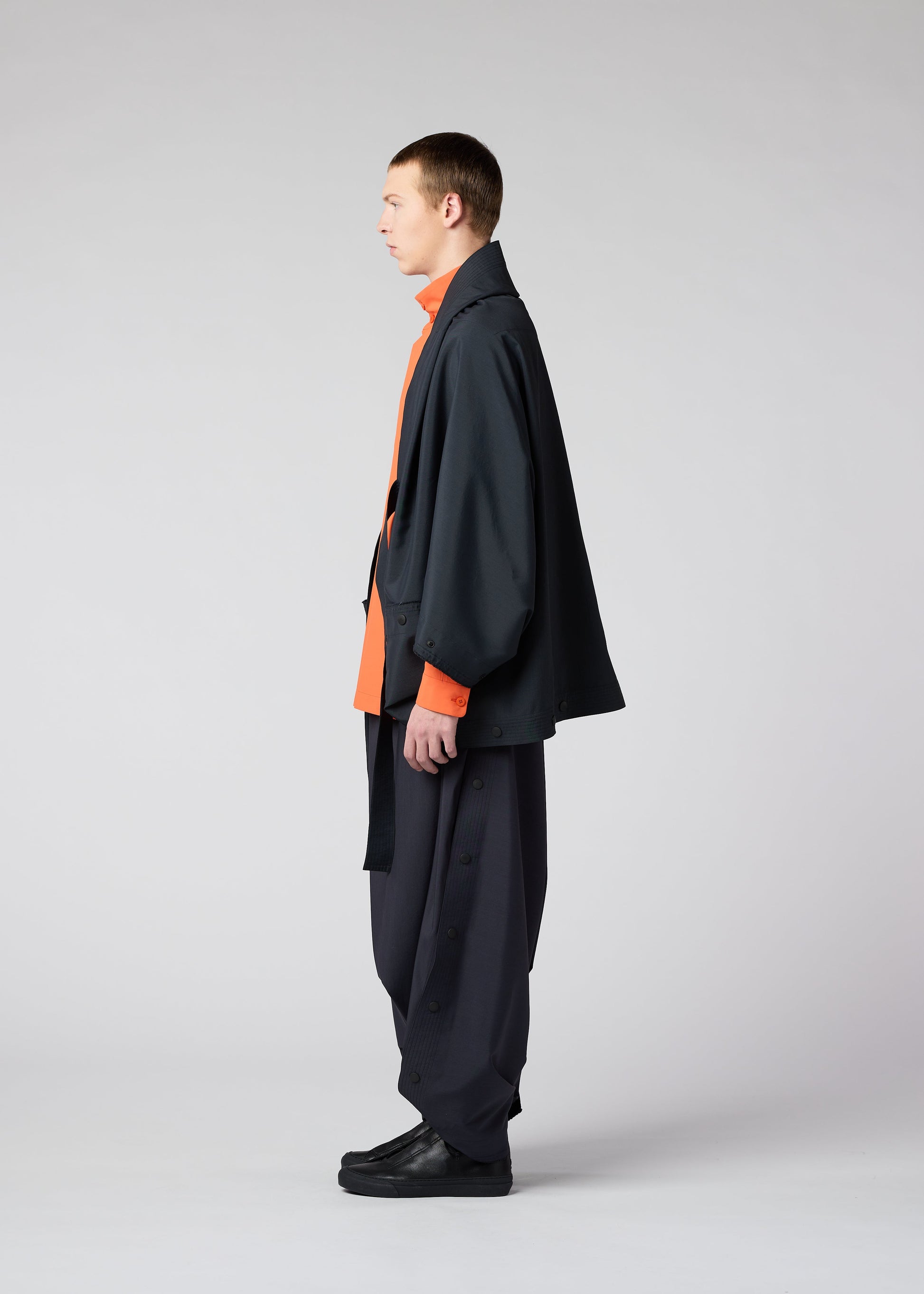 A model wears the IM MEN FLY jacket.