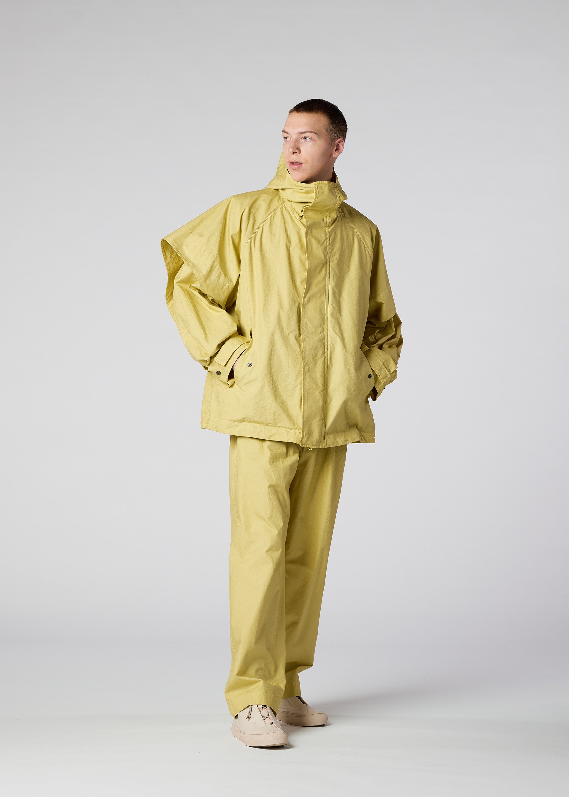 A model wears the IM MEN LIGHT COTTON jacket.