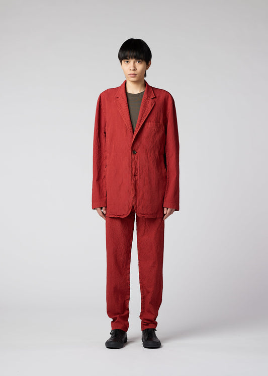 A model wears the IM MEN SHRINK DYE jacket.