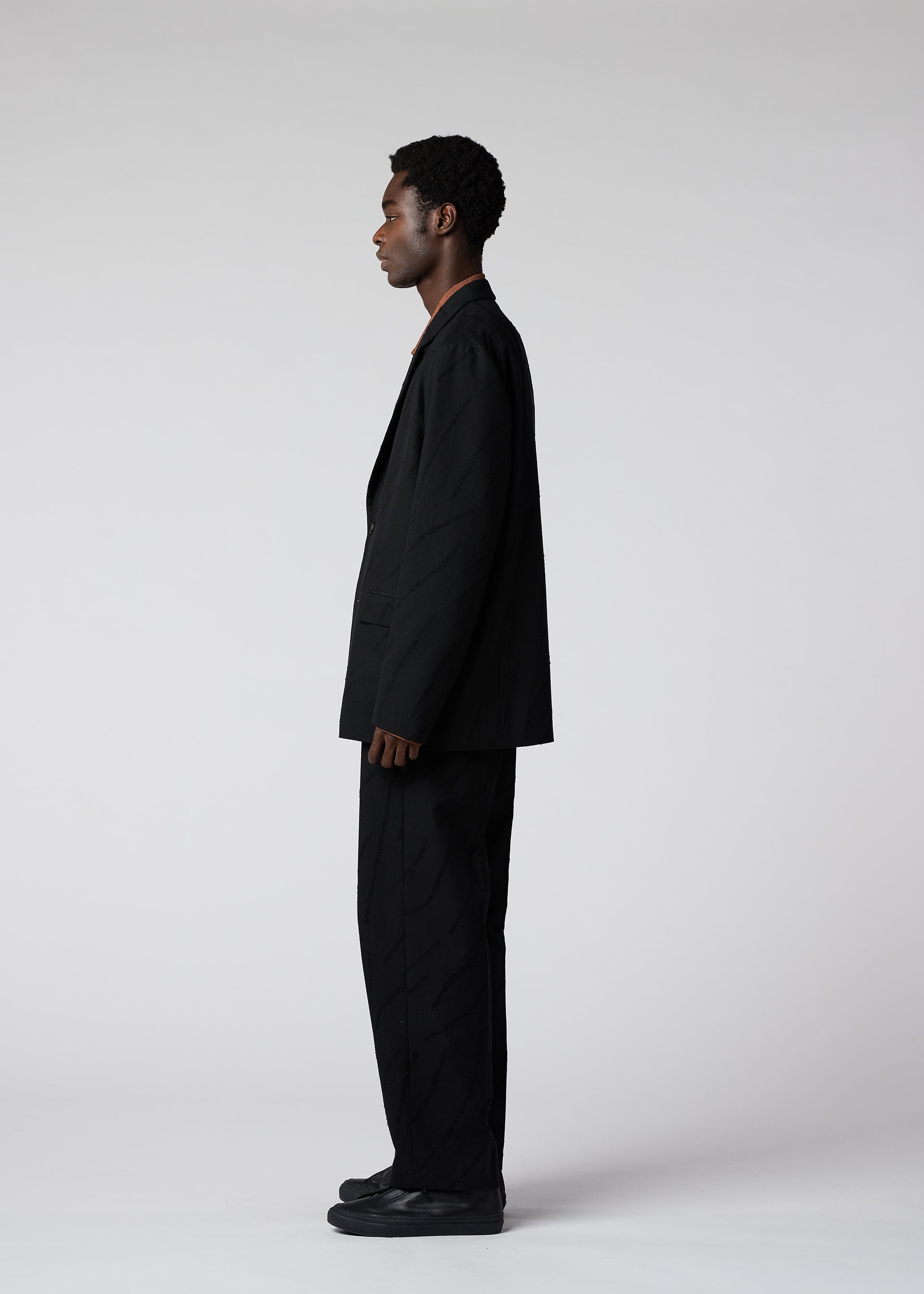 A model wears the IM MEN FLY WOOL jacket.