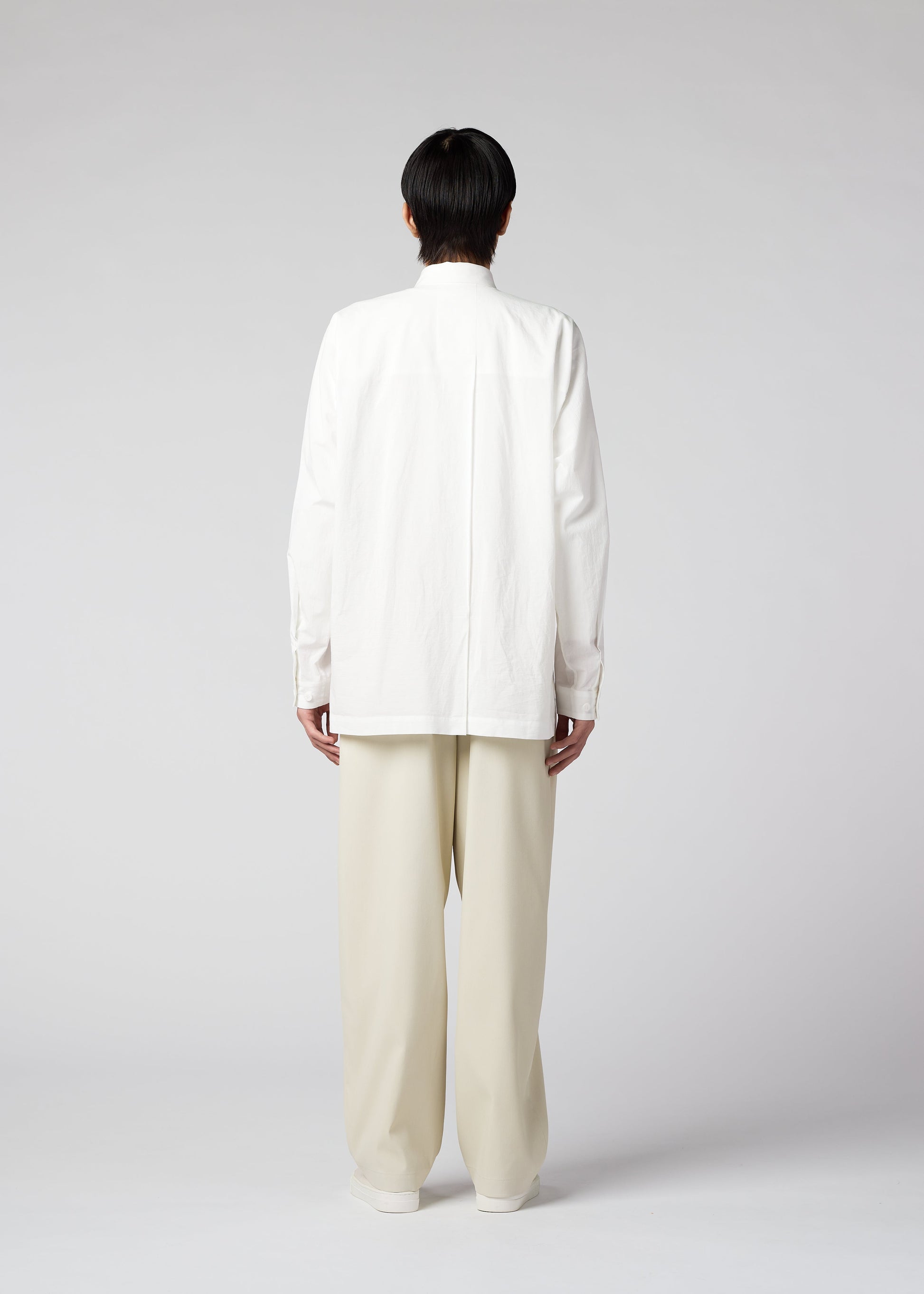 A model wears the IM MEN AIR trousers.
