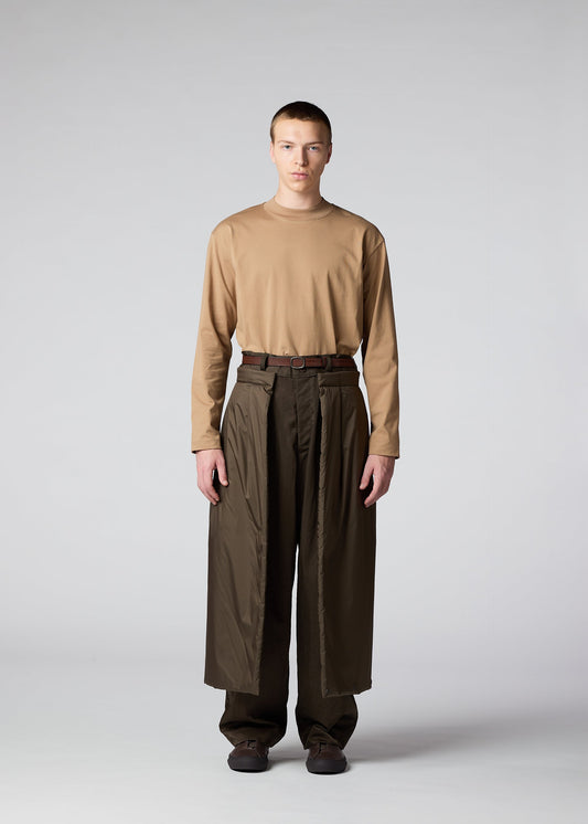 A model wears the IM MEN SWITCH trousers.
