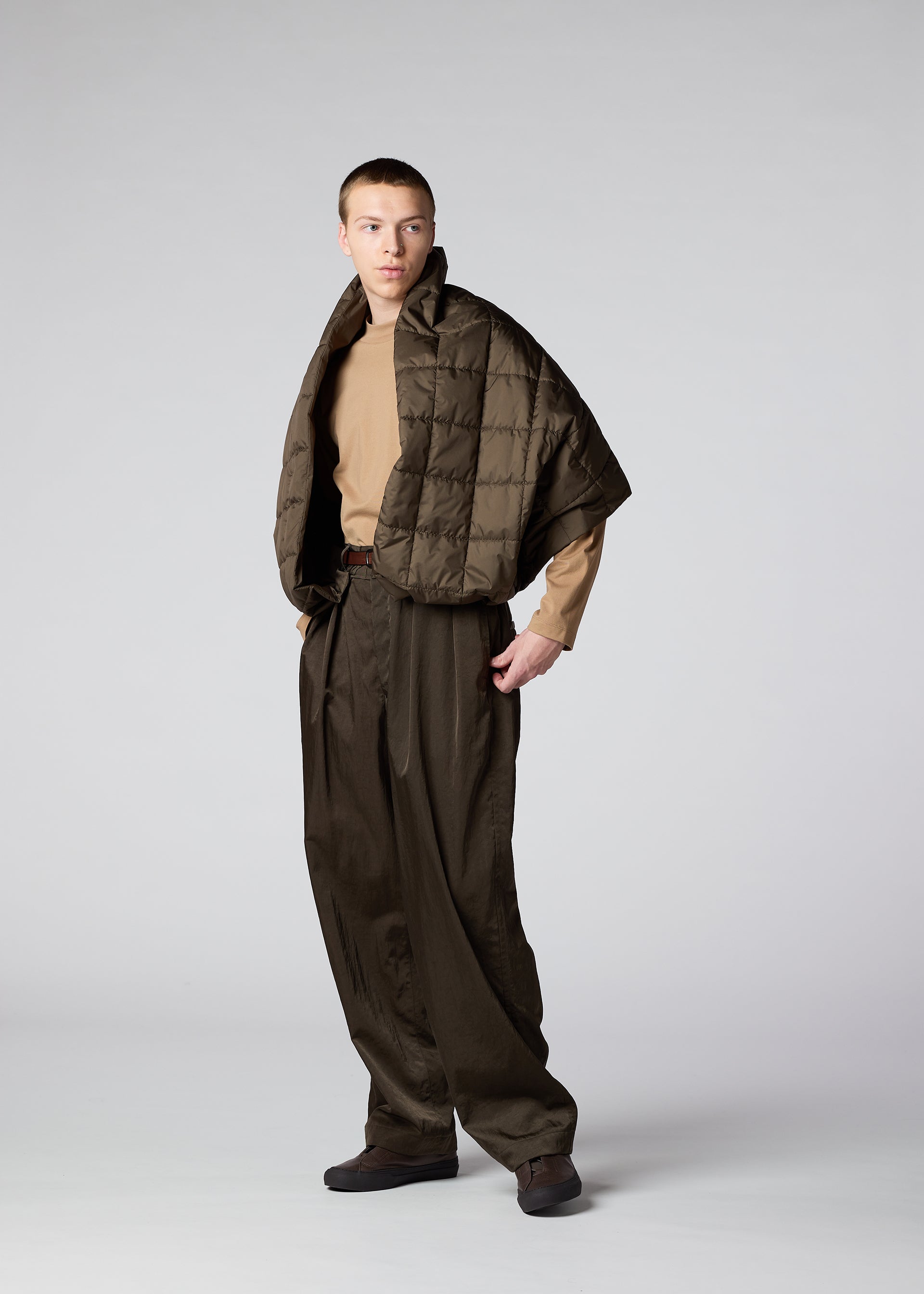 A model wears the IM MEN SWITCH trousers.
