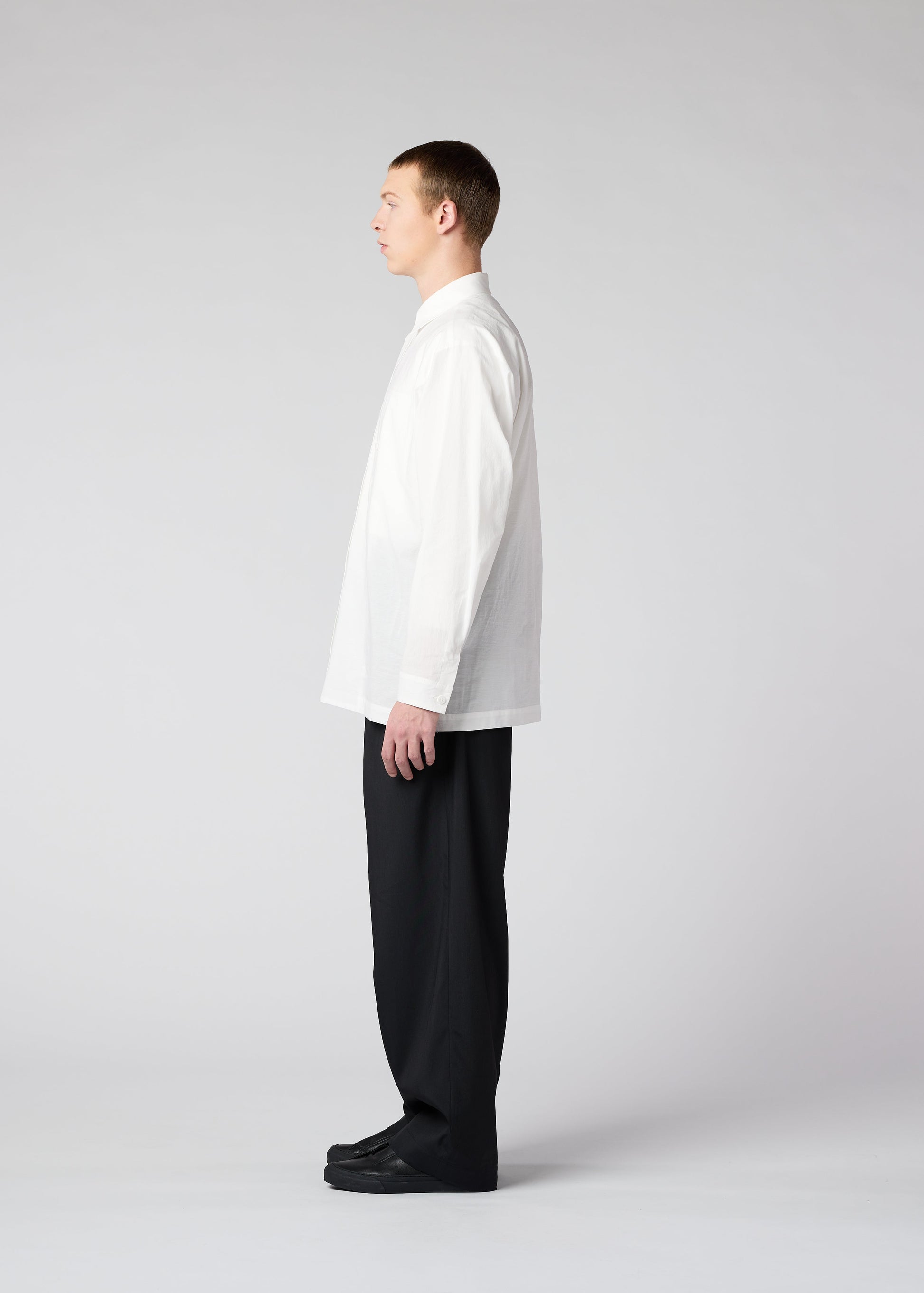 A model wears the IM MEN WHITE SHIRT shirt.