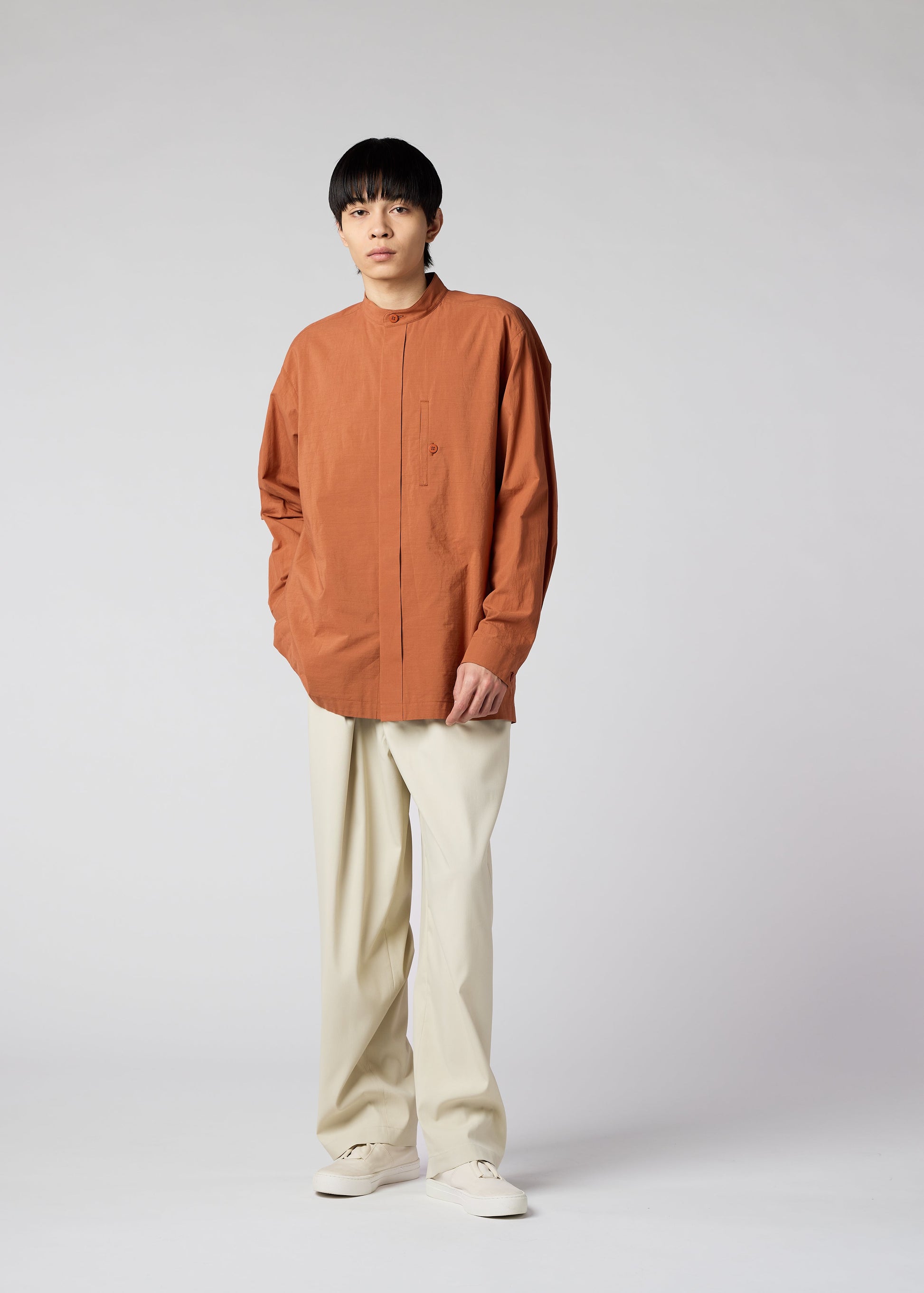 A model wears the IM MEN WHITE SHIRT shirt.