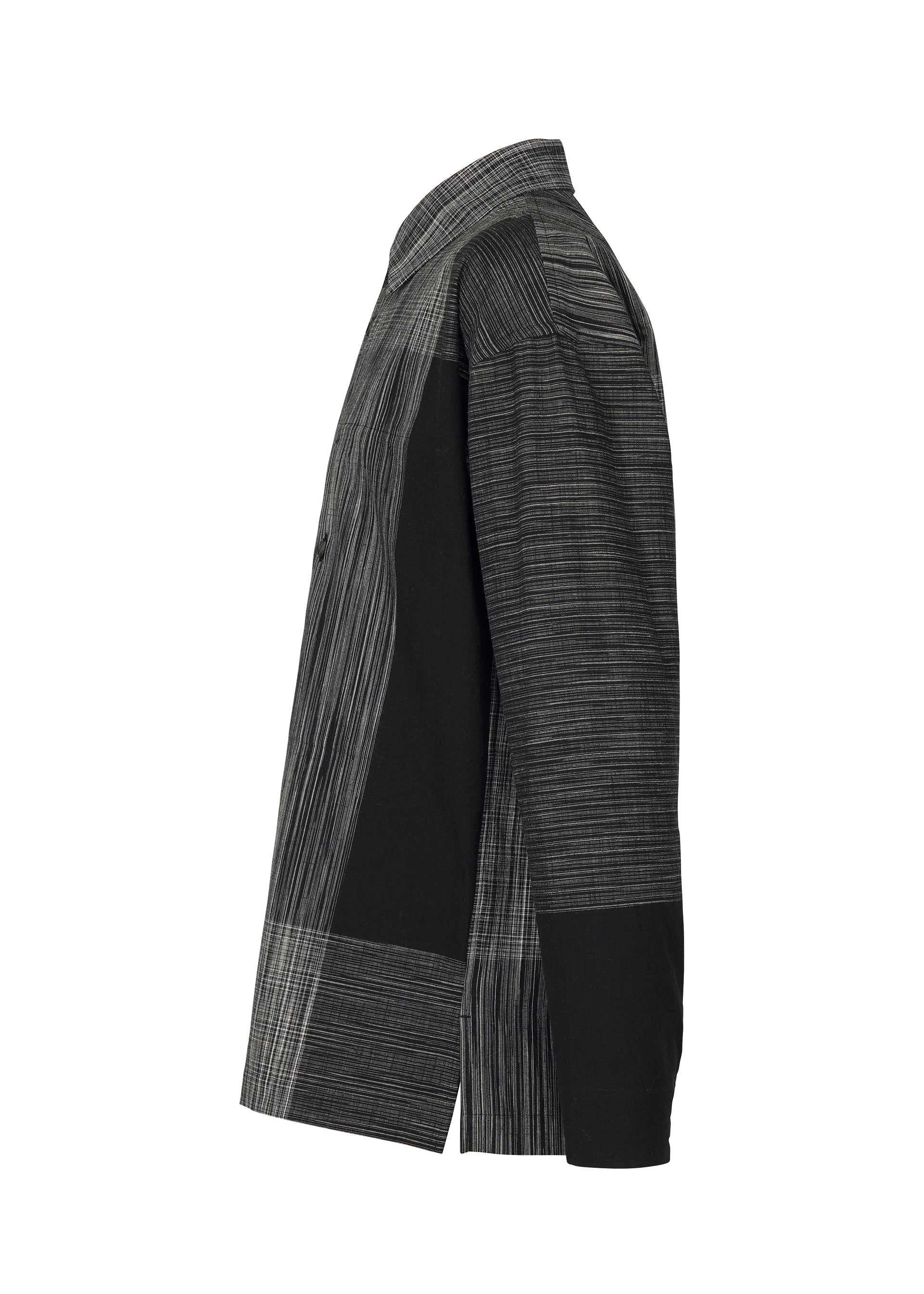 A detail shot of the IM MEN KASURI shirt.