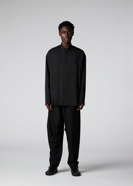 A model wears the IM MEN WINGS SHIRT shirt.