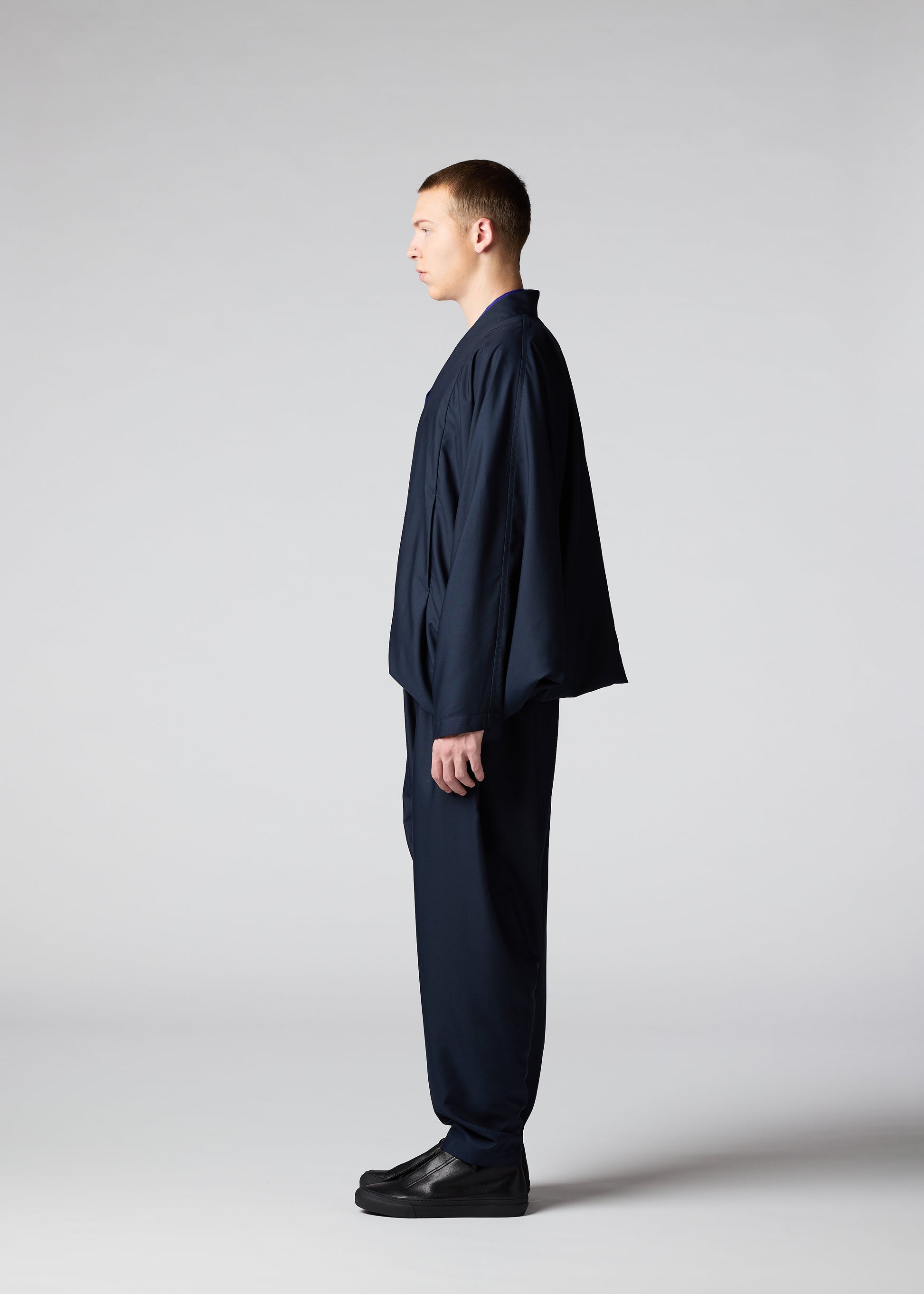 A model wears the IM MEN SWING jacket.