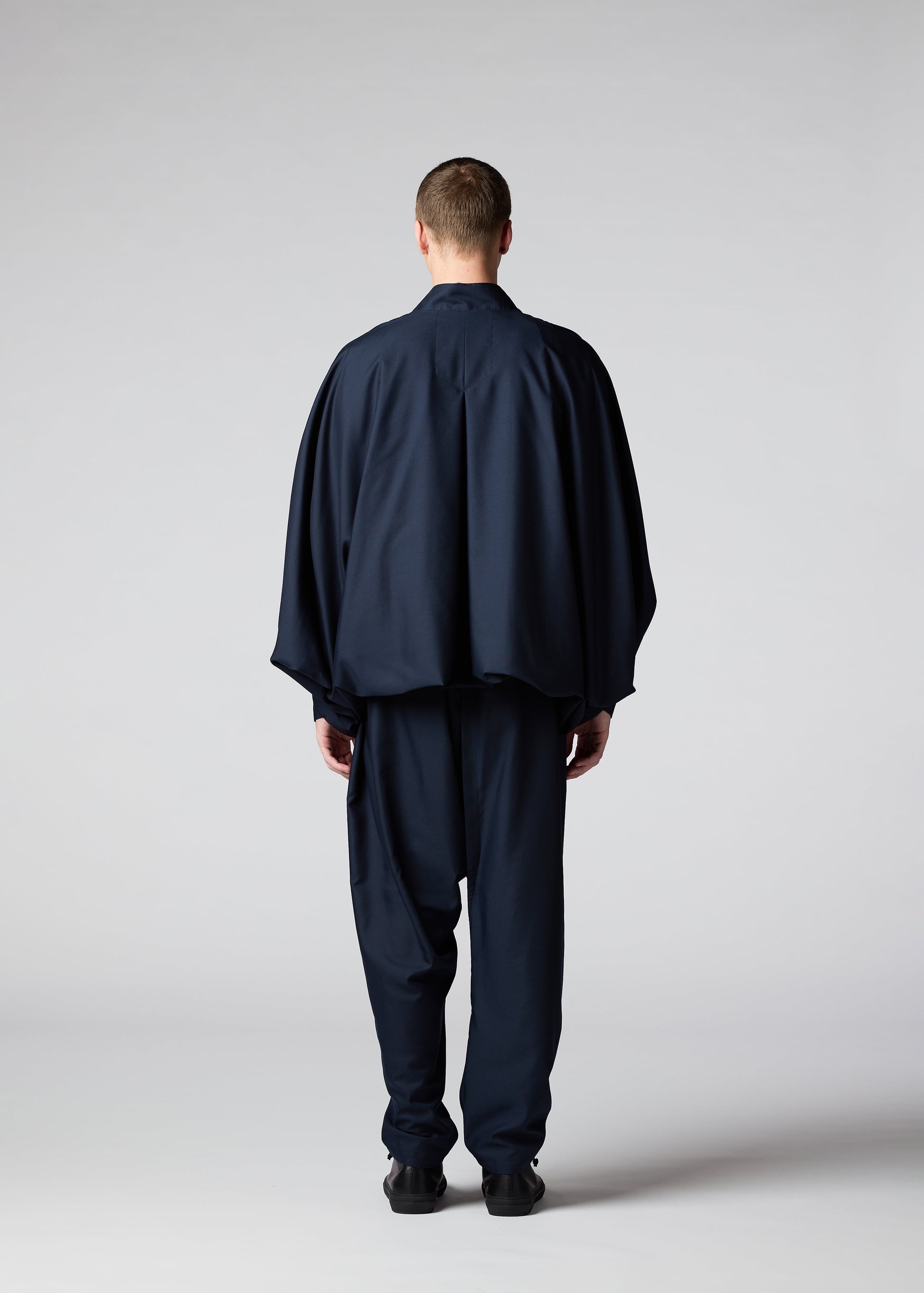 A model wears the IM MEN SWING jacket.