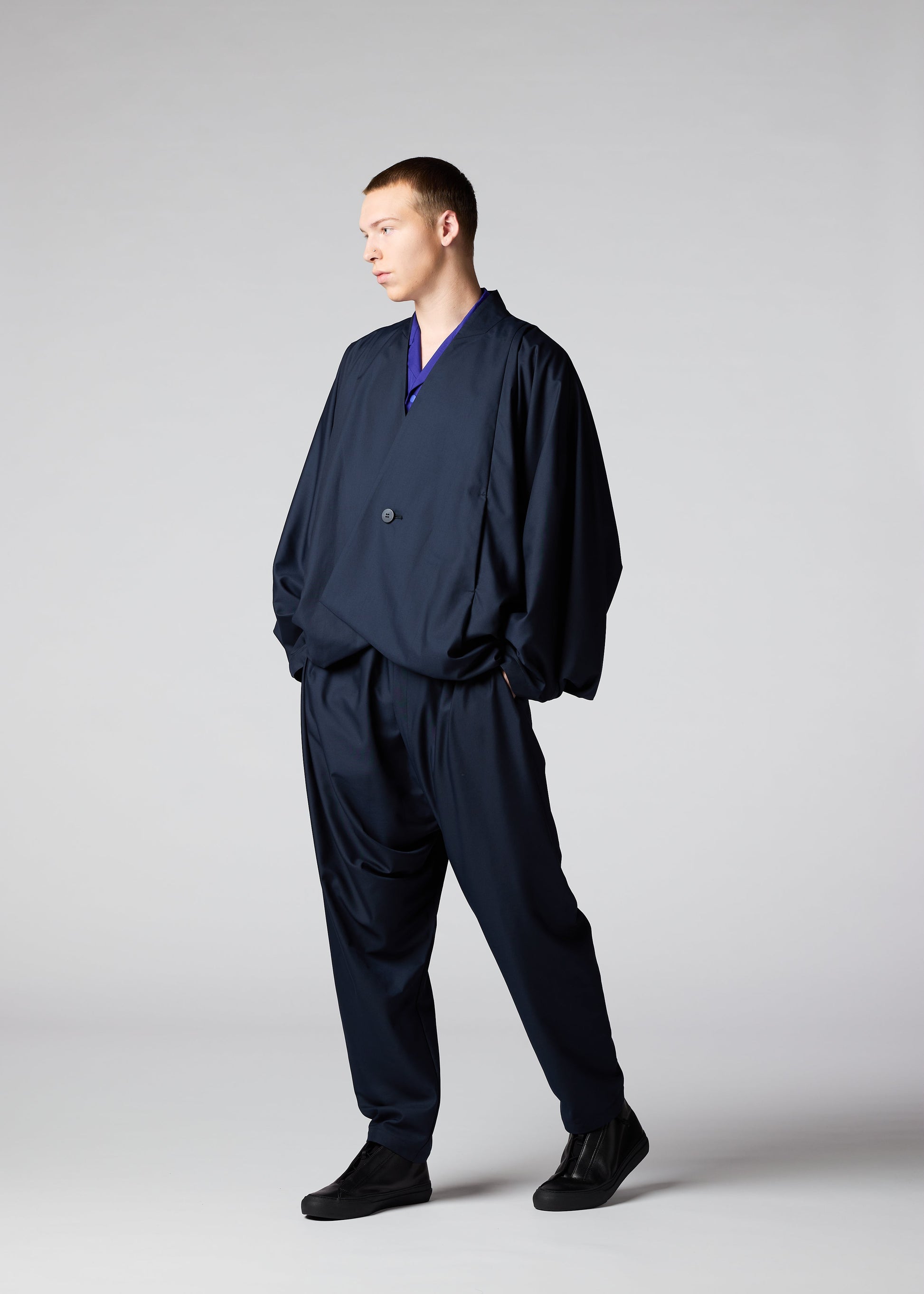 A model wears the IM MEN SWING jacket.