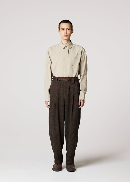 A model wears the IM MEN TEXTURES clothing.