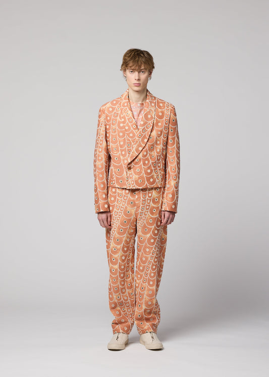 A model wears the IM MEN UROKOMON trousers.