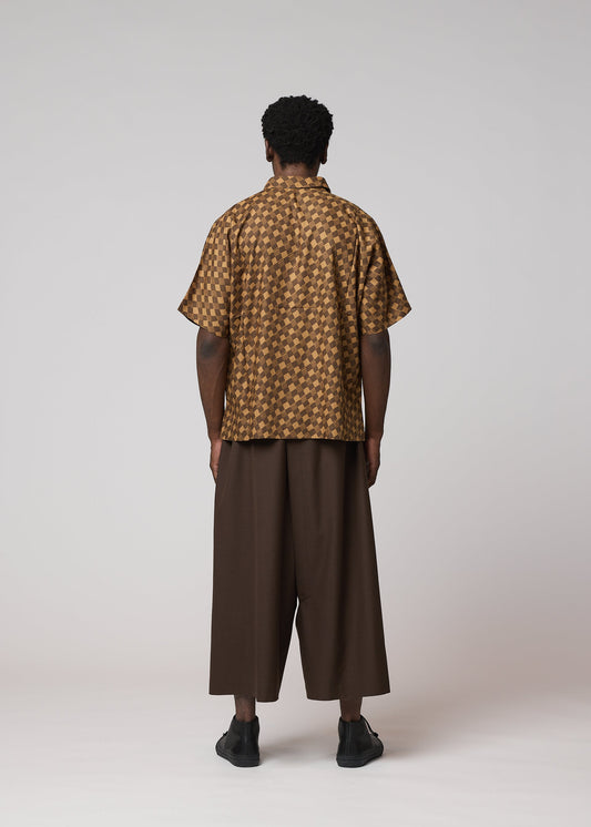 A model wears the IM MEN TIE PATTERN SHIRT tie-pattern-shirt-shirt-dark-brown.