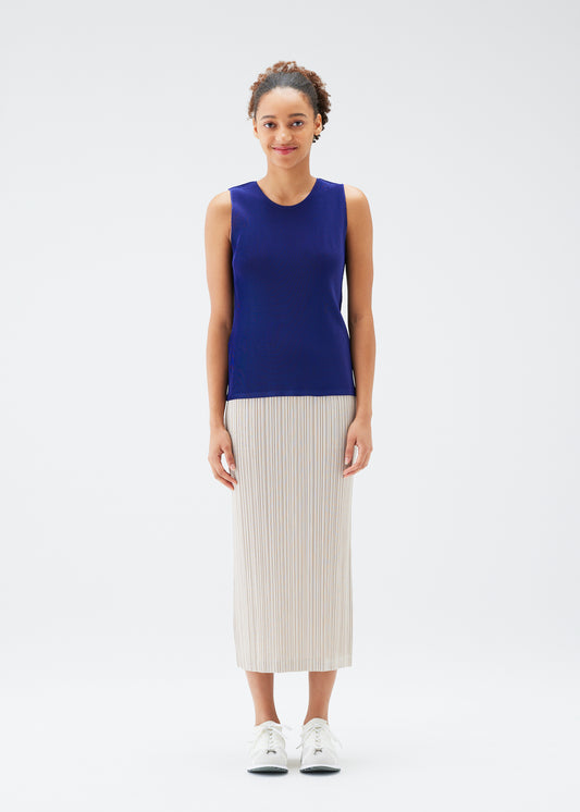 A model wears the PLEATS PLEASE ISSEY MIYAKE THICKER BOTTOMS 1 skirt