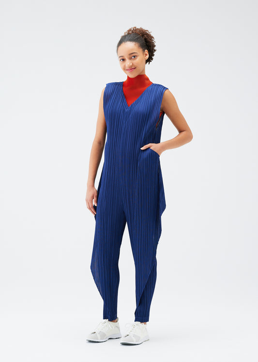 A model wears the PLEATS PLEASE ISSEY MIYAKE THICKER BOTTOMS 1 jumpsuit