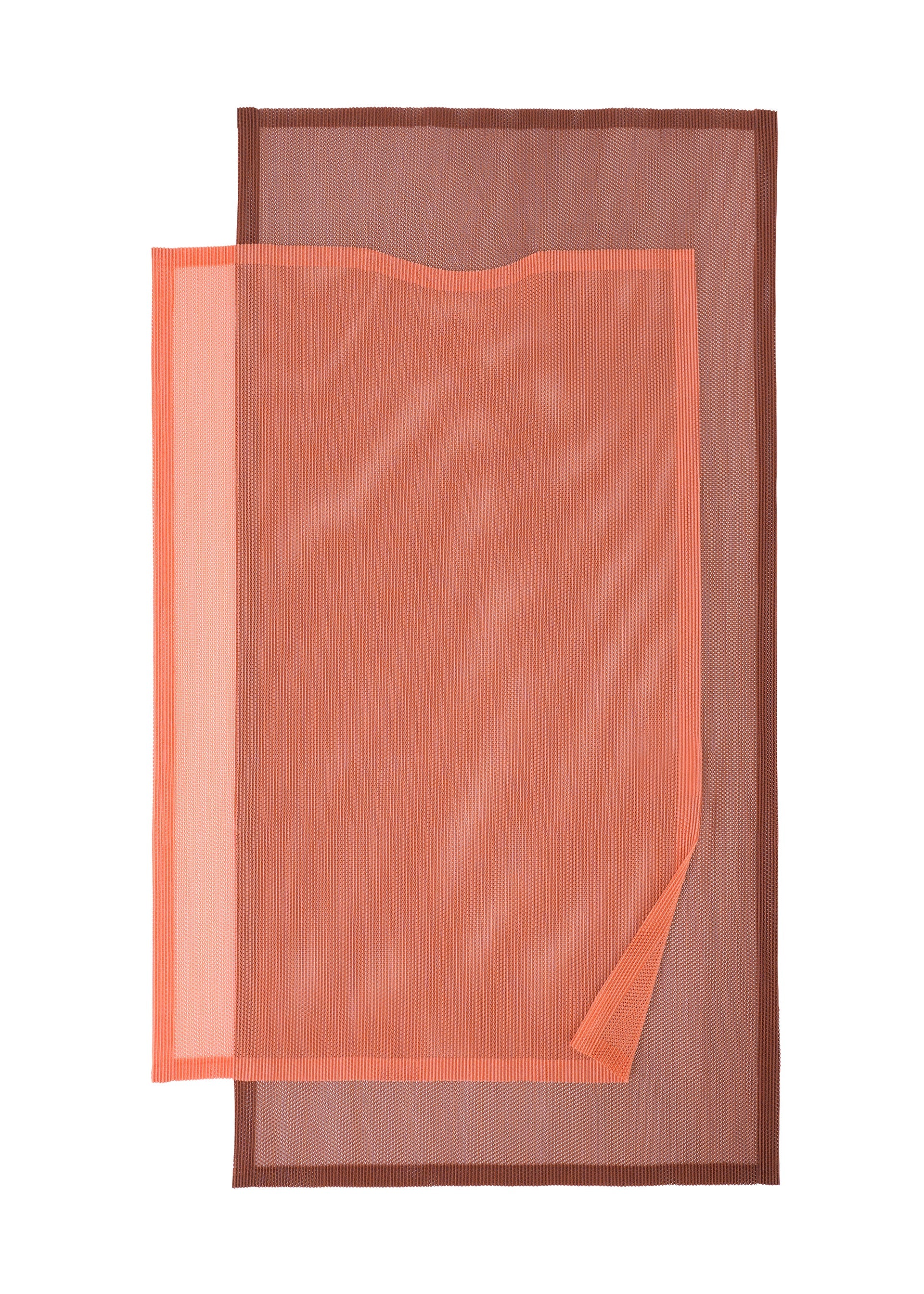 A detail shot of the PLEATS PLEASE ISSEY MIYAKE SHEER SQUARE tunic.