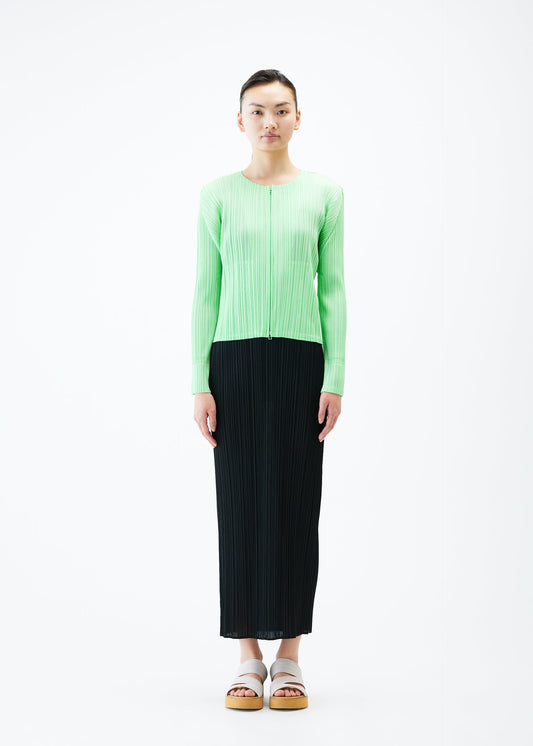A model wears the PLEATS PLEASE ISSEY MIYAKE MONTHLY COLORS MAY jacket.