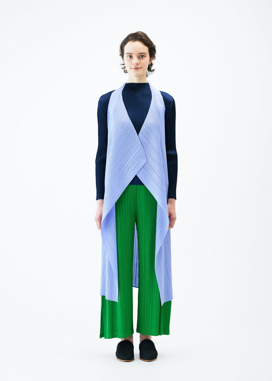 A model wears the PLEATS PLEASE ISSEY MIYAKE MONTHLY COLORS FEBRUARY vest.