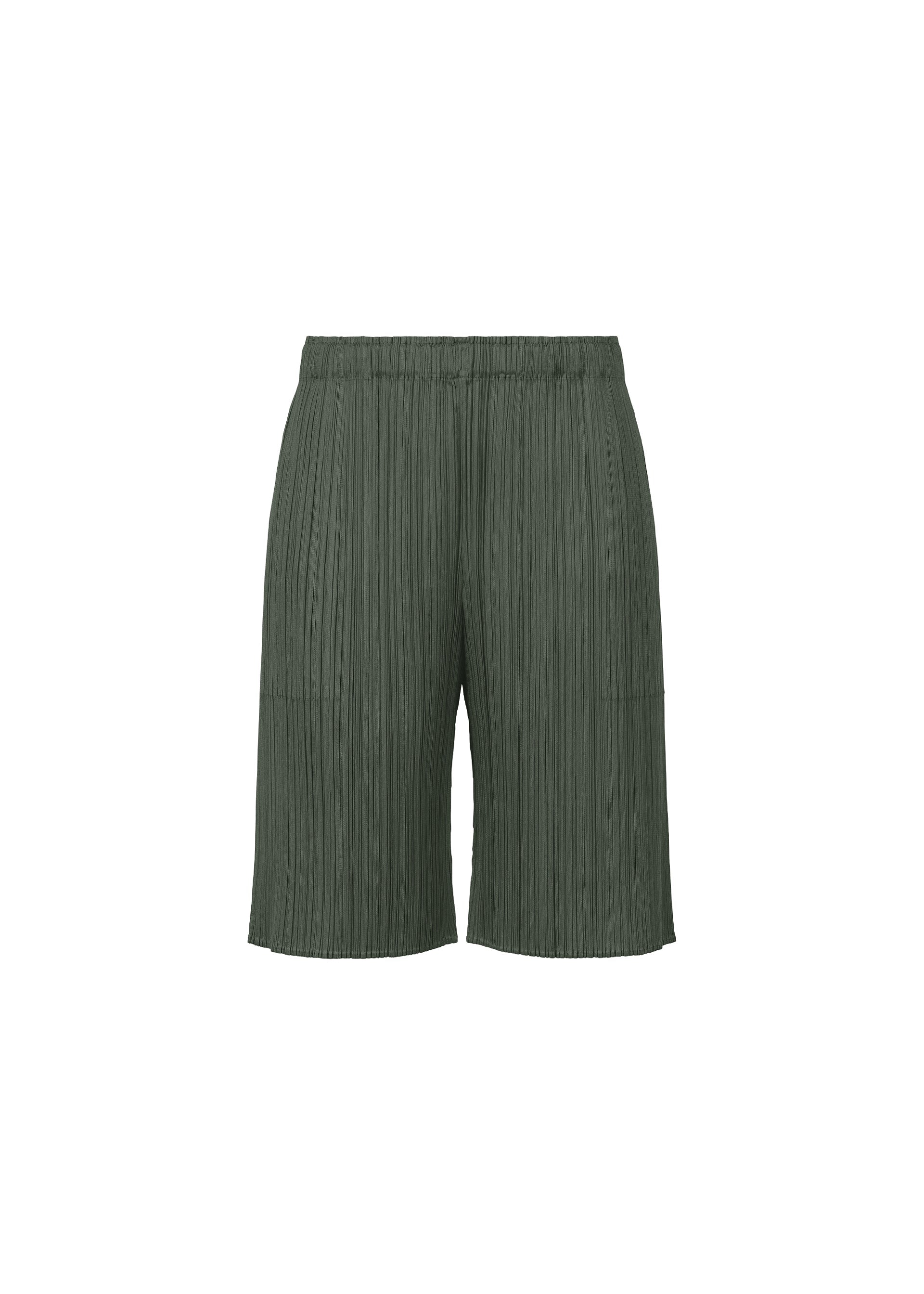 A product shot of the PLEATS PLEASE ISSEY MIYAKE MONTHLY COLORS : JUNE trousers in charcoal grey (6).