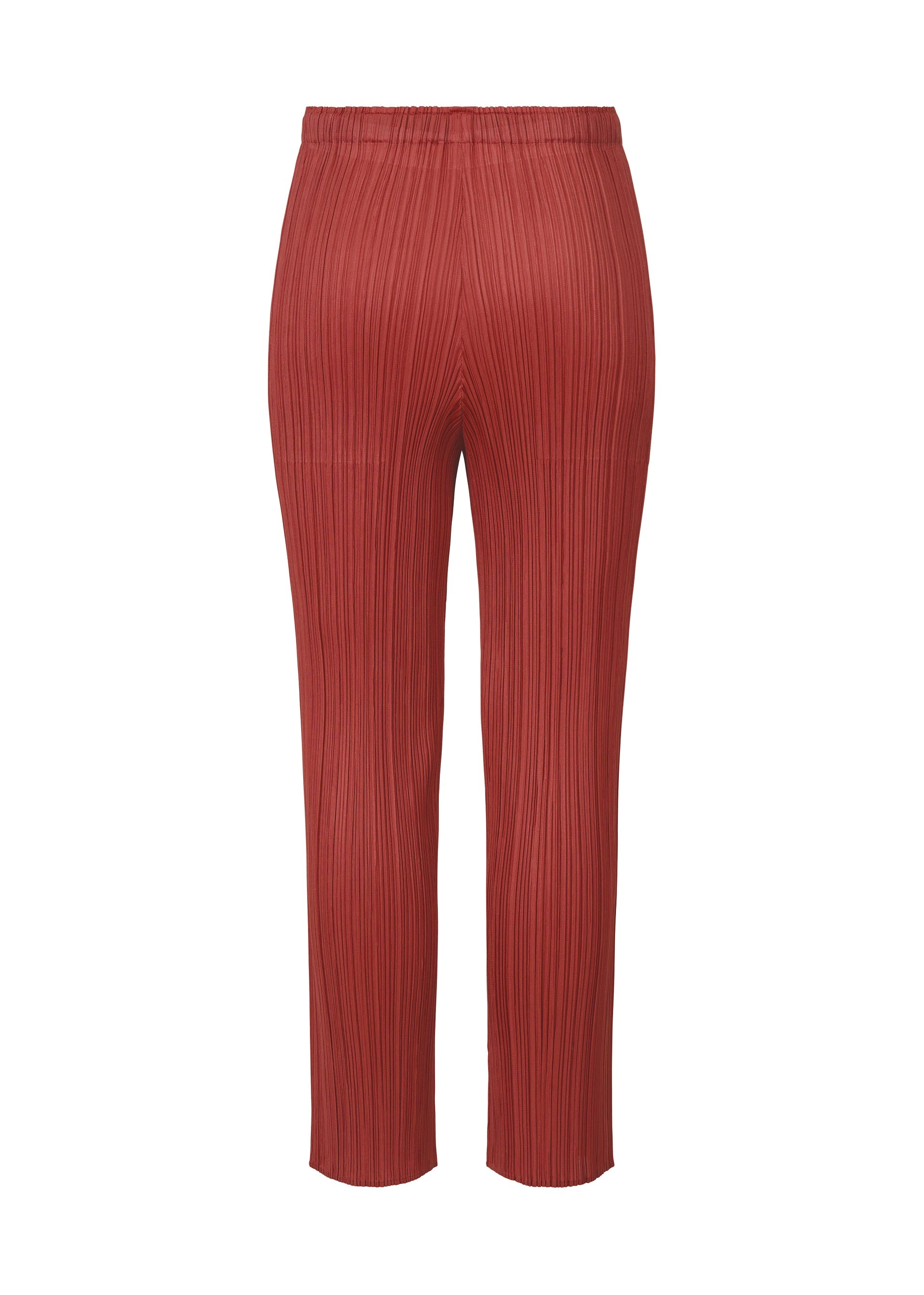 A detail shot of the PLEATS PLEASE ISSEY MIYAKE LAMP SHADE trousers.