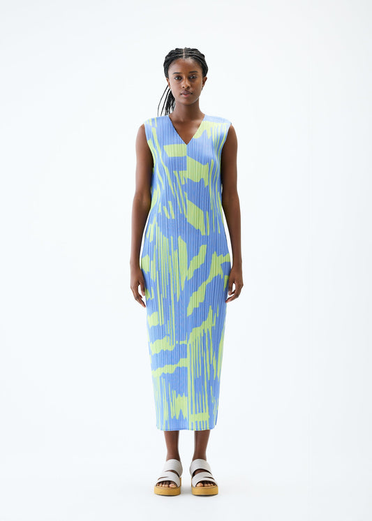 A model wears the PLEATS PLEASE ISSEY MIYAKE REFRACTION dress.