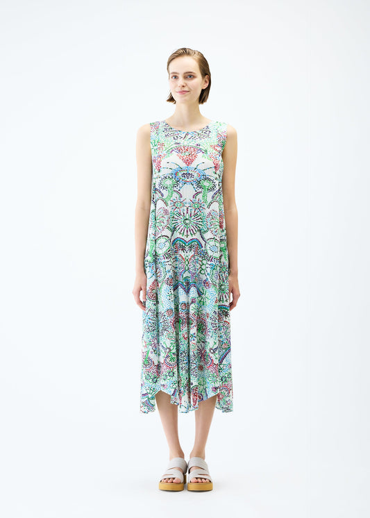 A model wears the PLEATS PLEASE ISSEY MIYAKE LIGHT FESTIVAL dress.