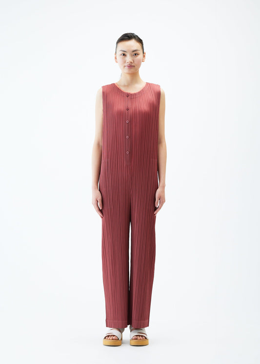 A model wears the PLEATS PLEASE ISSEY MIYAKE MONTHLY COLORS MAY jumpsuit.