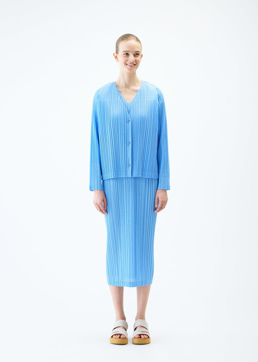 A model wears the PLEATS PLEASE ISSEY MIYAKE RAMIE PLEATS cardigan.