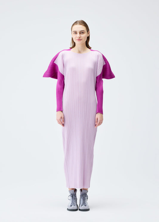 A model wears the PLEATS PLEASE ISSEY MIYAKE SQUARE dress.