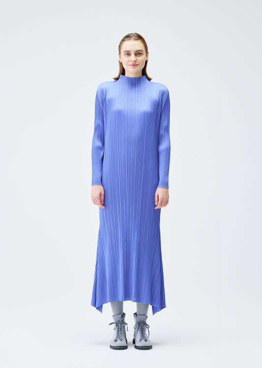 A model wears the PLEATS PLEASE ISSEY MIYAKE OLE! clothing.