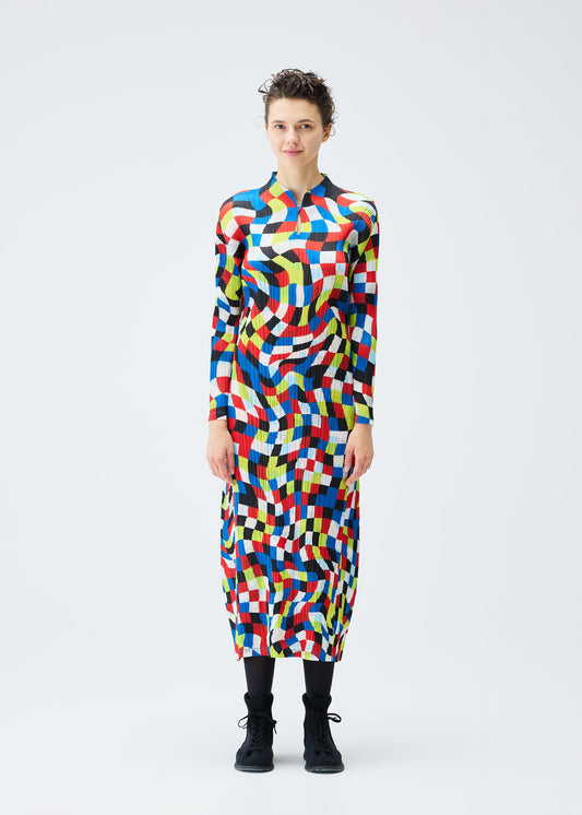 A model wears the PLEATS PLEASE ISSEY MIYAKE DANCING SQUARE dress.