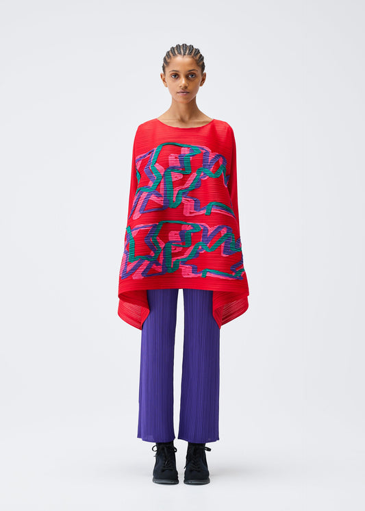 A model wears the PLEATS PLEASE ISSEY MIYAKE MIX top.