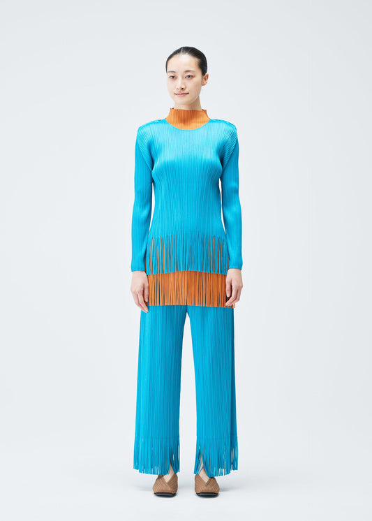 A model wears the PLEATS PLEASE ISSEY MIYAKE WAVE top.