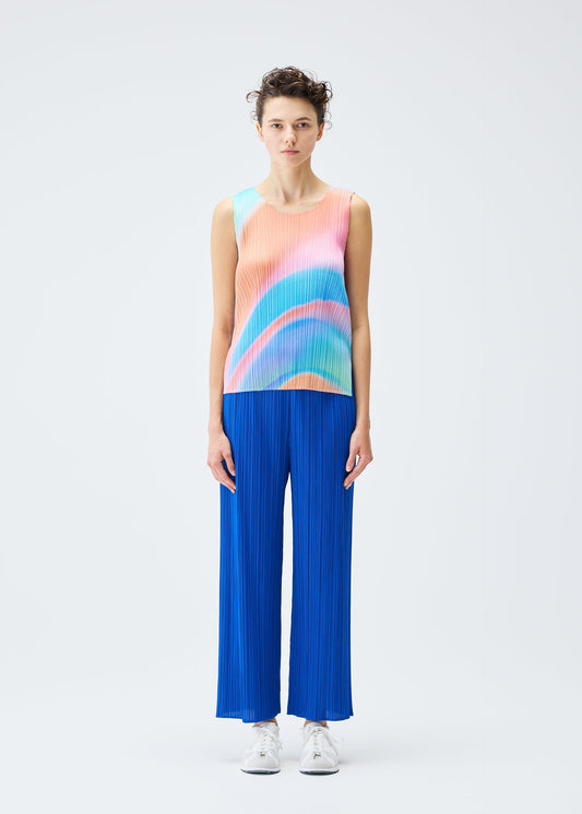 A model wears the PLEATS PLEASE ISSEY MIYAKE GROOVE top.