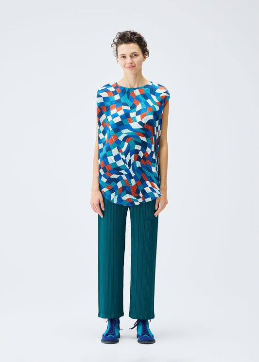 A model wears the PLEATS PLEASE ISSEY MIYAKE DANCING SQUARE top.