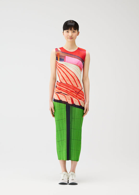 A model wears the PLEATS PLEASE ISSEY MIYAKE CITY COLLAGE clothing.