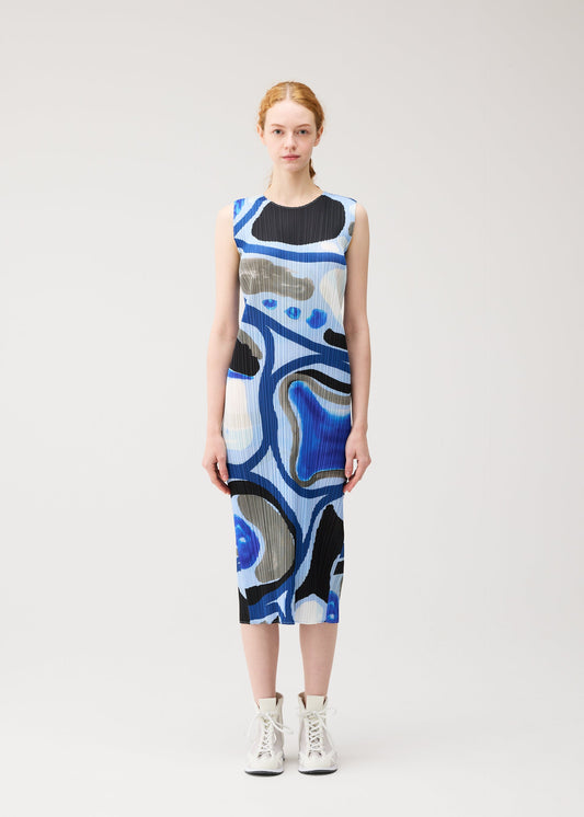 A model wears the PLEATS PLEASE ISSEY MIYAKE ROLL dress.