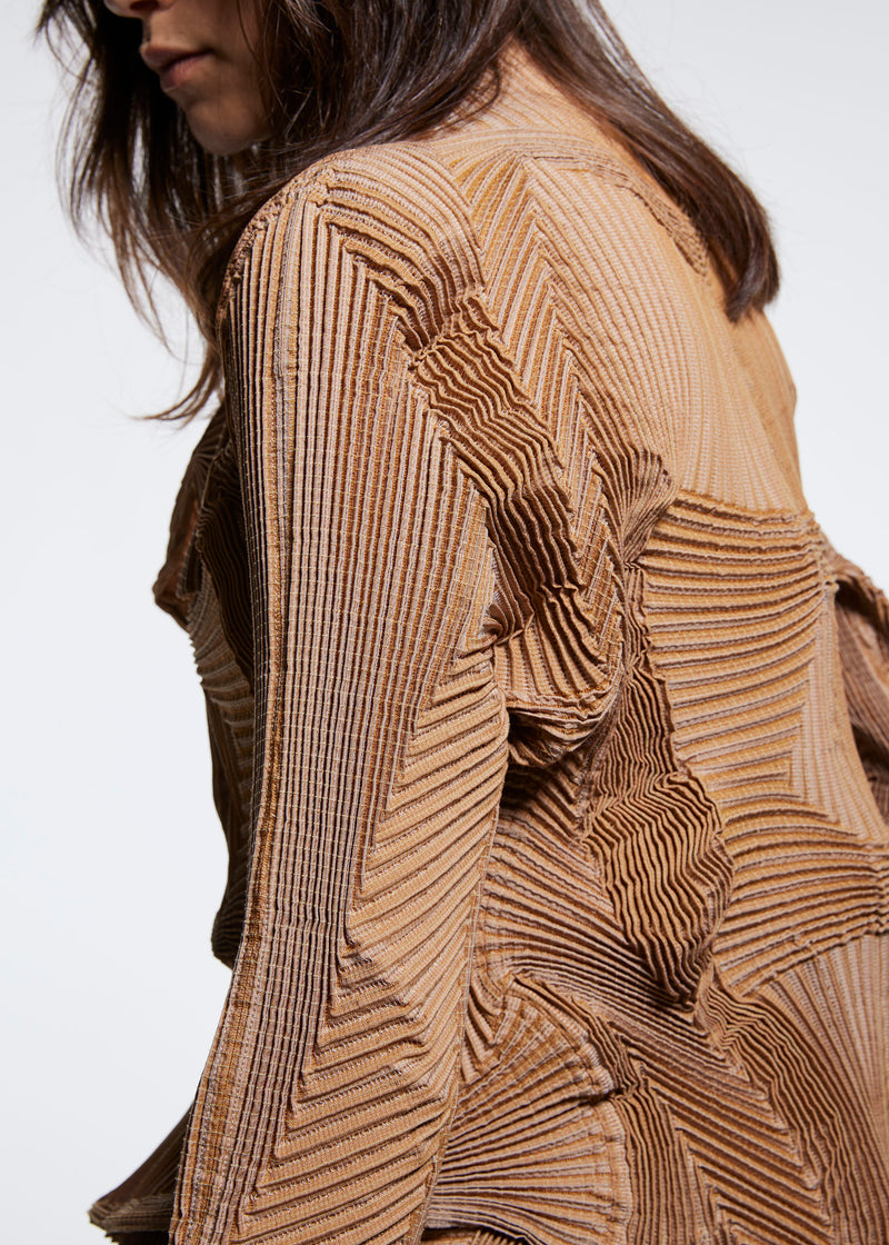 A model wears the A POC ABLE ISSEY MIYAKE  TYPE O 003 2 jacket