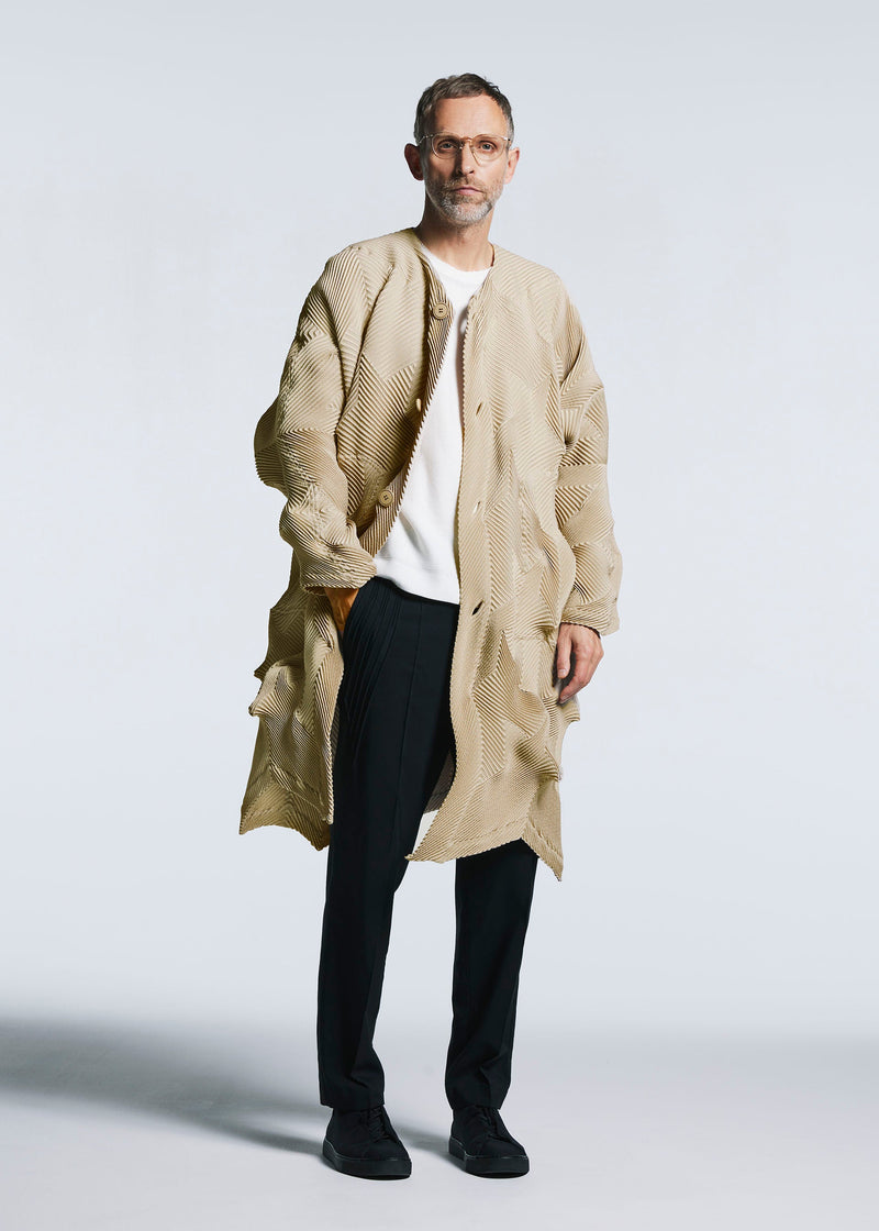 A model wears the A-POC ABLE ISSEY MIYAKE TYPE O 017 coat.