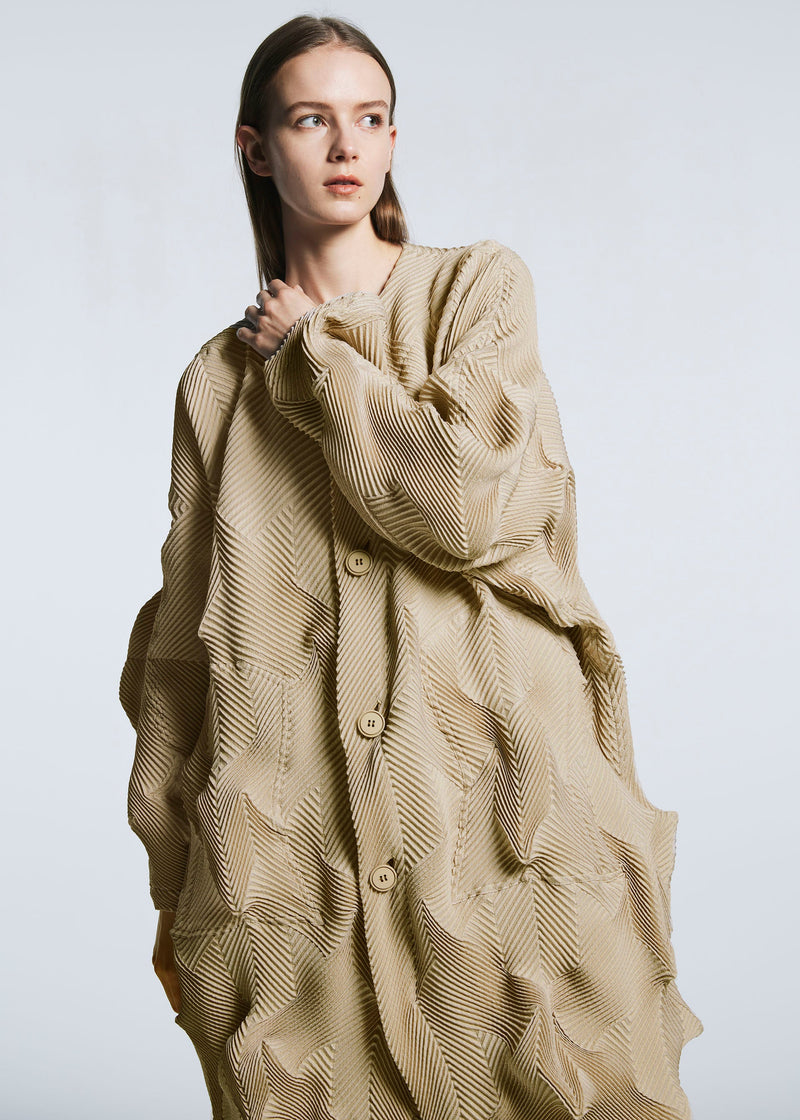 A model wears the A-POC ABLE ISSEY MIYAKE TYPE O 017 coat.